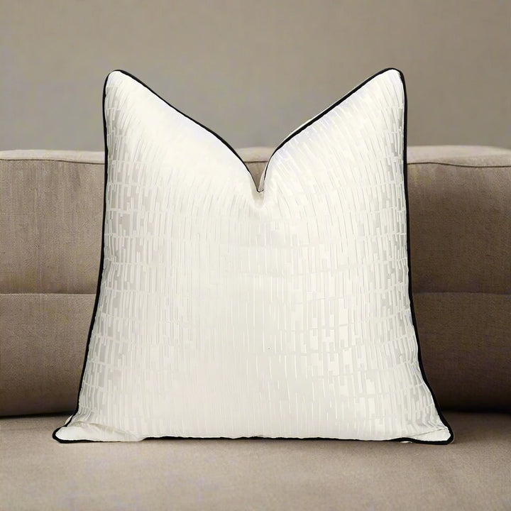 White Embossed Geometric Satin Black Contrast Pipe Cushion