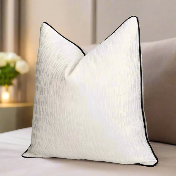 White Embossed Geometric Satin Black Contrast Pipe Cushion