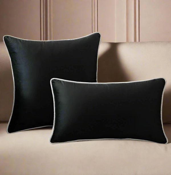 Elevate your living space with our Luxury Set of Six White and Black Velvet Piped Cushions.