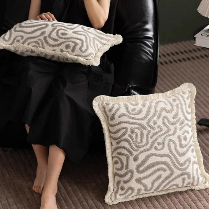 Abstract Embroidered Fringe Border Cushion