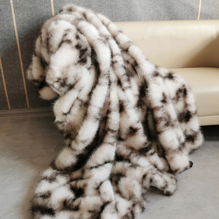 cream brown mix faux fur throw details on leather sofa