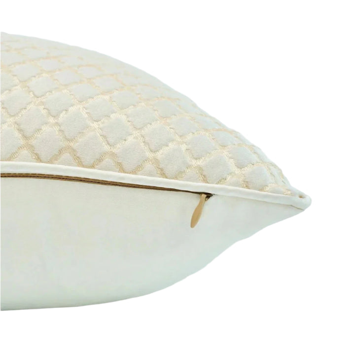 cream throw pillow with piped border