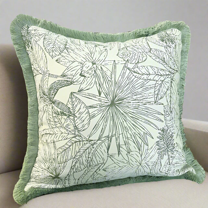 green leaf print cushion with fringe border