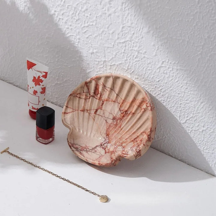 pink shell shaped marble tray